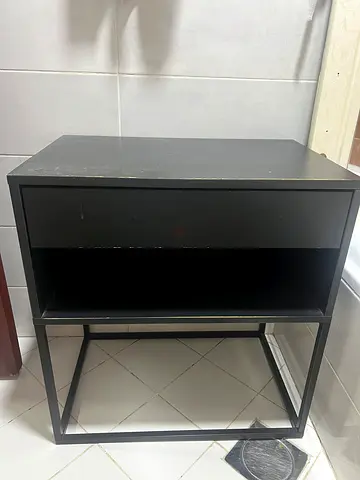 Black metal frame side table with drawer and open shelf