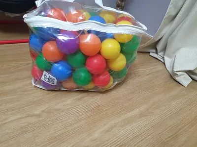 Bag of 83 Colorful Plastic Playpen Balls - Good Condition. School bag good condition