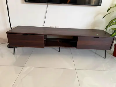 Low modern TV cabinet/entertainment unit - dark wood finish