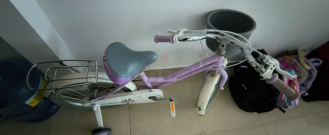 Kids purple bicycle with training wheels - used, good condition