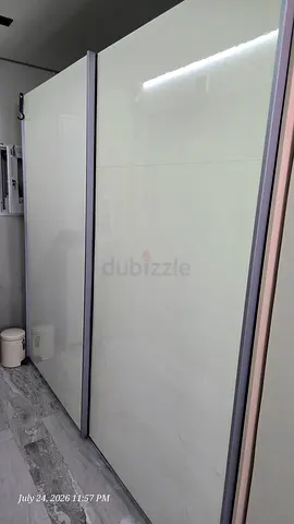 Large white sliding wardrobe with mirrored panels — good condition