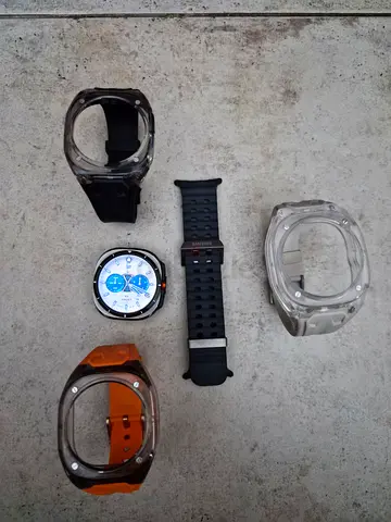 Samsung Galaxy watch ultra titanium with extra straps and protective bezels