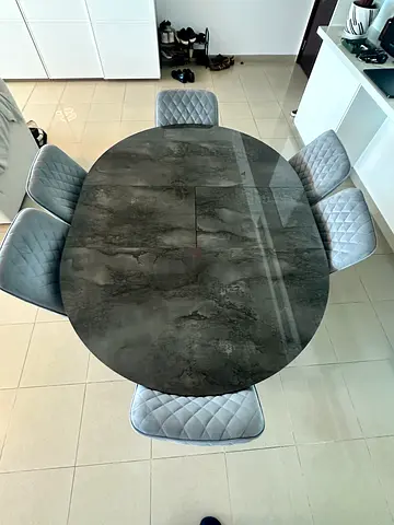 One oval extendable Dining Table plus Set of 6 Grey Velvet Dining Chairs with Black Legs