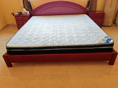 Red wooden king-size bed frame with headboard and 2  matching nightstands