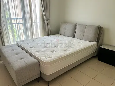 Queen fabric upholstered bed frame with mattress and storage bench - light grey