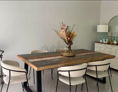 Wooden dining table with 8 chairs