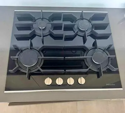 Miele built in 4 Burner Gas Cooktop black look Exellent Condition