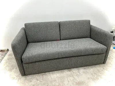 Like new condition marina home two seater sofa bed