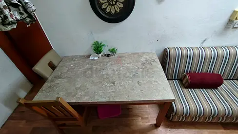 Wooden dining table with marble top - good condition