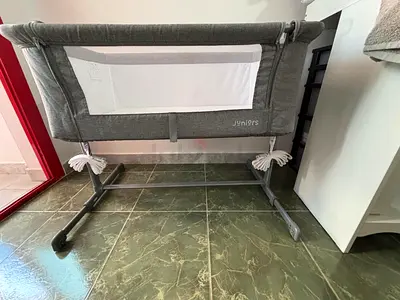 Juniors bedside bassinet / portable baby cradle in grey - good condition