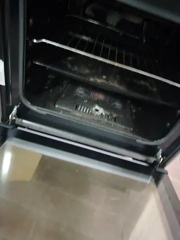 Used gas cooking range - needs cleaning