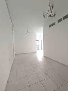 Annual apartment for rent in Sharjah, Al Qasimia Al Nad area, King Faisal Street, directly next to N