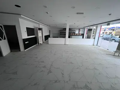 Shop for annual rent in Al Rashidiya 1 Excellent location next to Ramada Hotel Area: 180 square meters Includes a kitchen and bathroom Large shopfront