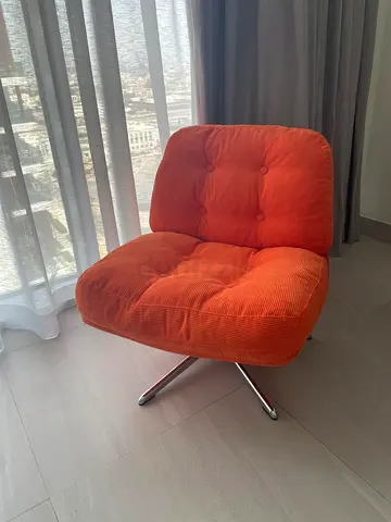Orange mid-century modern swivel lounge chair (new, good condition)