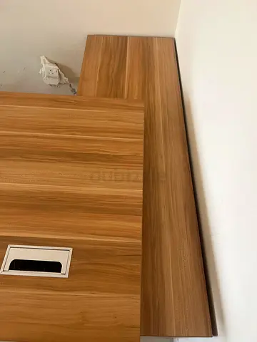 Wood Finish L-Shaped Office Desk with Cable Port - Good Condition