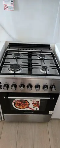 5-burner Stainless Steel Gas Range with Oven - Good Condition