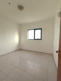 2BR Apartment for Rent in Abu Shagara Directly on Al Wahda Street | Free Central AC &amp; Parking