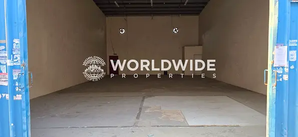 مستودع للإيجار على شارع رئيسي في الجرف الصناعية 1 | مساحة 2,000 قدم مربع | كهرباء 30 كيلوواط ثلاثية الطور | بالقرب من تشاينا مول وماكس