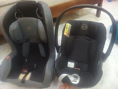 1-Baby Carry coat with Car seat, 2- Baby Car Seat multiple action