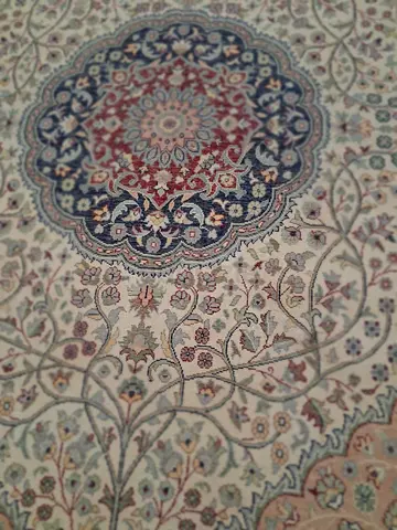 Classic Persian-style area rug in cream and blue, good condition