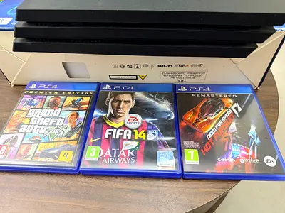 Sony PS4 Pro 1TB with 2 Controllers and 3 Games (GTA V, FIFA 14, Need for Speed)