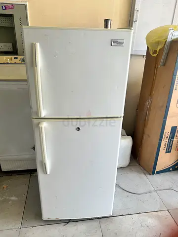 White double-door refrigerator in working condition — pickup in Dubai