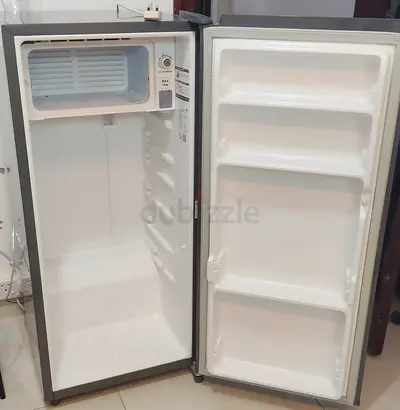 Compact single-door refrigerator with small freezer with key - good condition