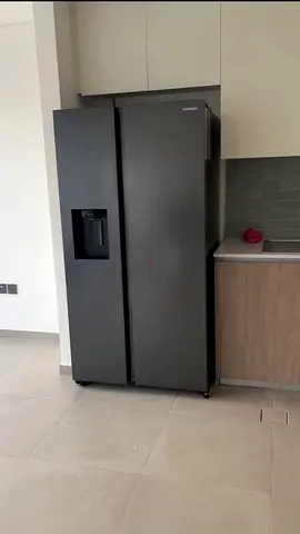Samsung side by side fridge and freezer new model slightly used