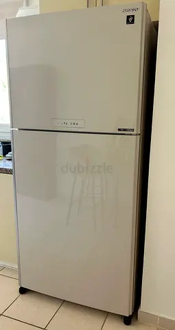 Sharp 2-Door Refrigerator - Good Condition, Spacious (Silver)