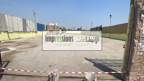 13,000 Sq.Ft. Fully Interlocked Open Yard for Rent in Industrial Area 03, Sharjah | Office, Pantry & Washroom | Prime Industrial Location