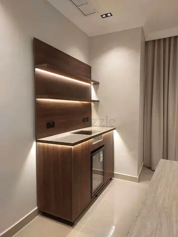 Compact wooden kitchenette cabinet with LED shelves and minibar