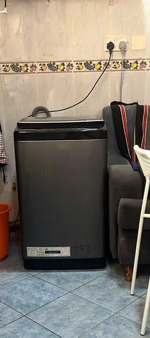 8 kg Washing machine with good working and looks. Top load