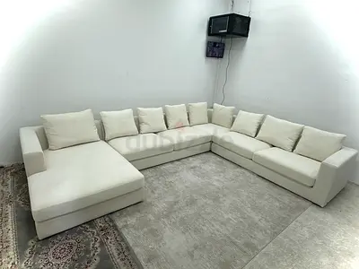 Like new condition the one brand cream color Ushape sofa