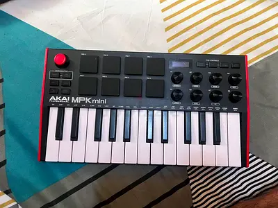 AKAI MPK Mini MIDI Controller - 25-Key Compact Keyboard with Pads