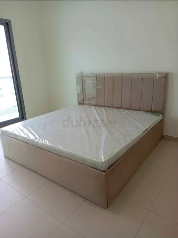 King upholstered storage bed with mattress - new