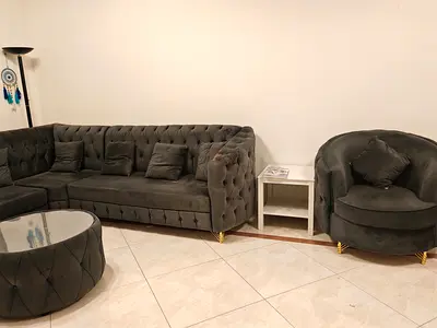 Grey Velvet L-Shaped Sofa with Matching Round Ottoman and Accent Chair. 8 seats +round tea poe