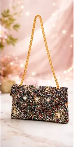 Embellished beaded evening clutch with gold chain strap