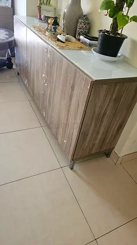 Storage cabinet with glass top