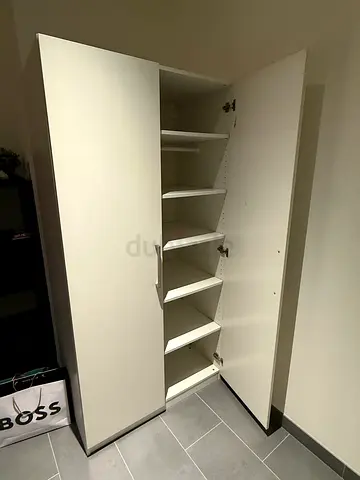 IKEA white tall wardrobe with multiple shelves - good condition