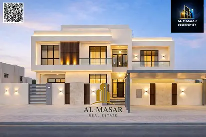 Two-story villa with a roof terrace in Al Muwaihat, featuring 7 master bedrooms and an internal ele