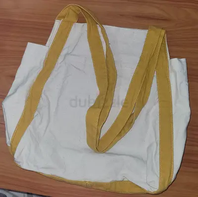 MOVING OUT SALE: Plain white canvas tote bag with yellow trim and long handles