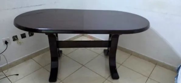 Solid Dark Wood Oval Dining Table - Seats 4-6, Good Condition