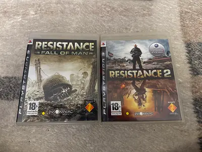 Resistance 2 and Resistance: Fall of Man (PS3) - two PS3 game discs