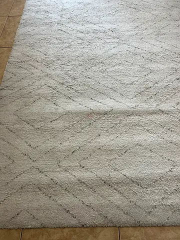 IKEA Light beige textured area rug with subtle geometric pattern - 230x160