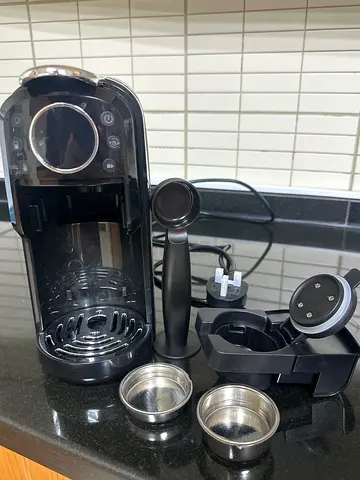 New - used only once - Capsule Coffee Machine with Accessories - Good Working Condition