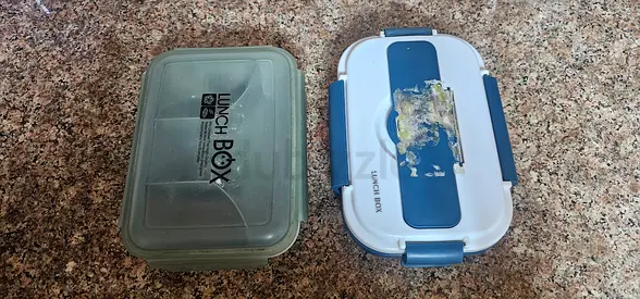 Two used plastic lunch boxes - snap lock and compartment styles