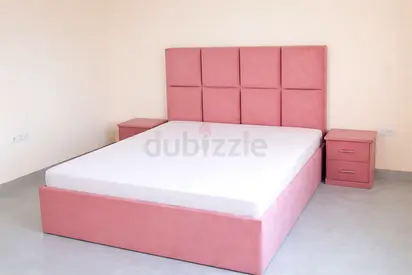 New Pink upholstered double bed with two matching bedside tables