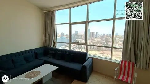 شقة مفروشة (غرفة وصالة) للإيجار في أبراج "أورينت" (Orient Towers) - تشمل موقف سيارات وإطلالة بحرية - السعر 32,000 درهم فقط