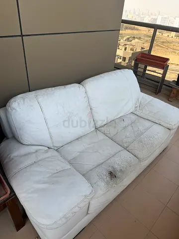 White 2-seater leather sofa (used, needs cleaning/repair)