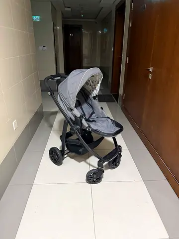 Lightweight grey baby stroller in good condition